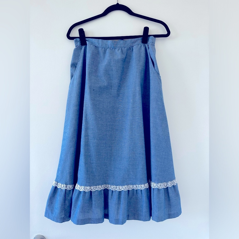 Blue skirt with white lace detailing